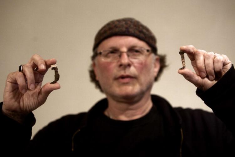Simcha Jacobovici, the producer of Secrets Of Christianity series, shows the Roman nails which he believes may have been used in the crucifixion of Jesus, during a press conference in Jerusalem, on April 12,2011.  (Menahem Kahana/AFP/Getty Images)
