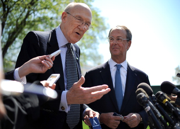 Democrat Erskine Bowles (R) and Republican Alan Simpson speak to reporters after a 2011 meeting with U.S. President Barack Obama at the White House in Washington, DC.