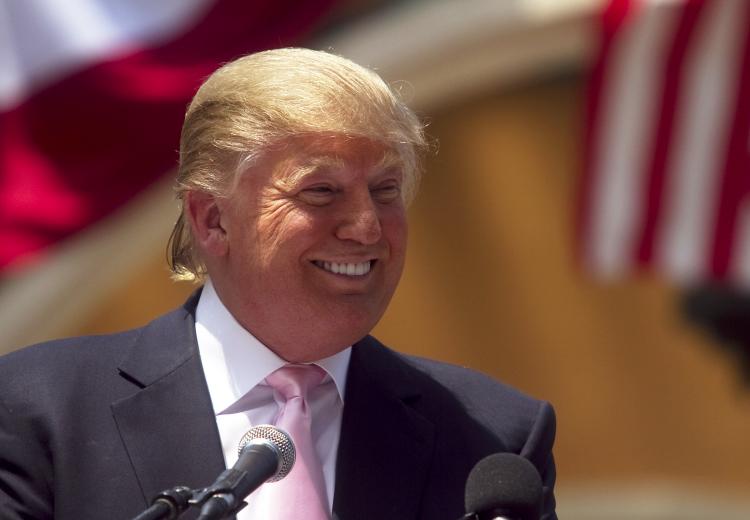 PRESIDENT TRUMP? Billionaire Donald Trump laughs while speaking to a crowd at the 2011 Palm Beach County Tax Day Tea Party on April 16 at Sanborn Square in Boca Raton, Fla. Trump is considering a bid for the 2012 presidency and is expected to announce his running in the coming weeks. (John W. Adkisson/Getty Images)