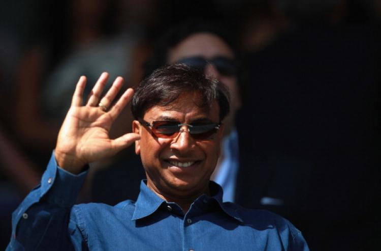 Lakshmi Mittal, Britaian's richest man and owner of Queens Park Rangers Football Club (QPR), waves before the npower Championship home match at Loftus Road in London between QPR and Hull City on April 25. (Warren Little/Getty Images)