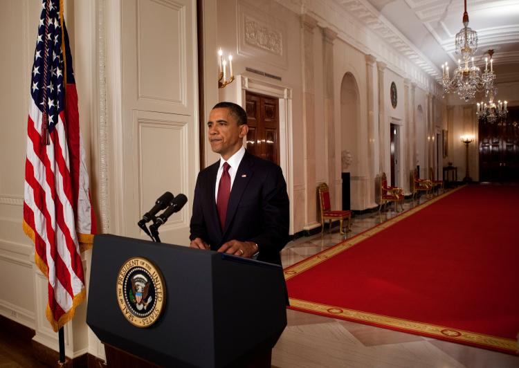 U.S. President Barack Obama stands after addressing the nation on TV from the East Room of the White House to make a televised statement on Sunday in Washington. Osama bin Laden has been killed near Islamabad, Pakistan almost a decade after the terrorist of Sept. 11, 2001 and his body is in possession of the United States. (Brendan Smialowski-Pool/Getty Images)