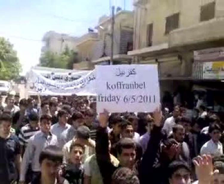 Syrians demonstrating in Kofr Bel on May 6 a 'Day of Defiance' in which thousands of Syrians rallied even as the regime of President Bashar al-Assad deployed tanks in at least three centers of an uprising against his autocratic rule. (AFP/Getty Images)
