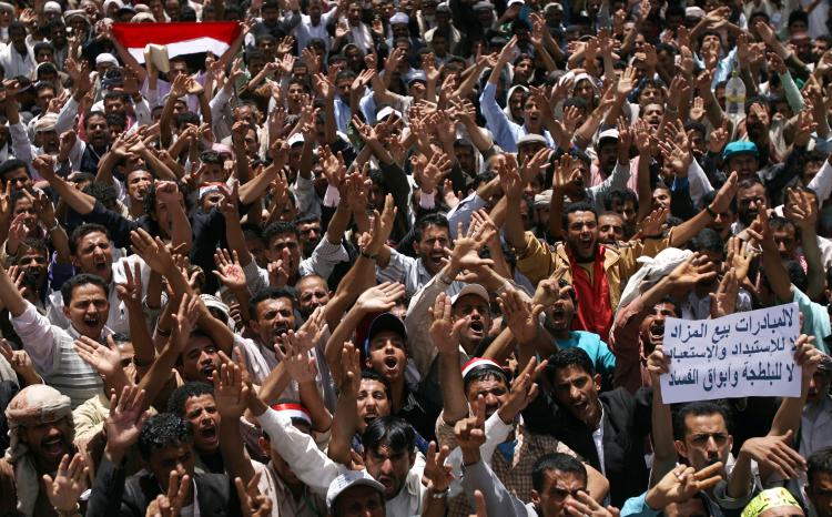 Yemeni anti-government protesters chant slogans against President Ali Abdullah Saleh in Sanaa on May 9. (Mohammed Huwais/AFP/Getty Images)