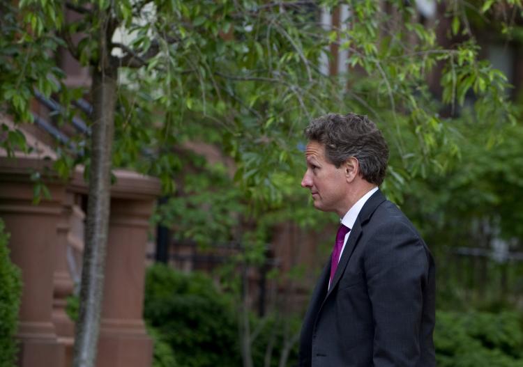 US Secretary of Treasury Timothy Geithner walks to a bipartisan meeting of US lawmakers working on legislative framework for comprehensive deficit reduction at Blair House near the White House on May 10. (Saul Loeb/AFP/Getty Images)