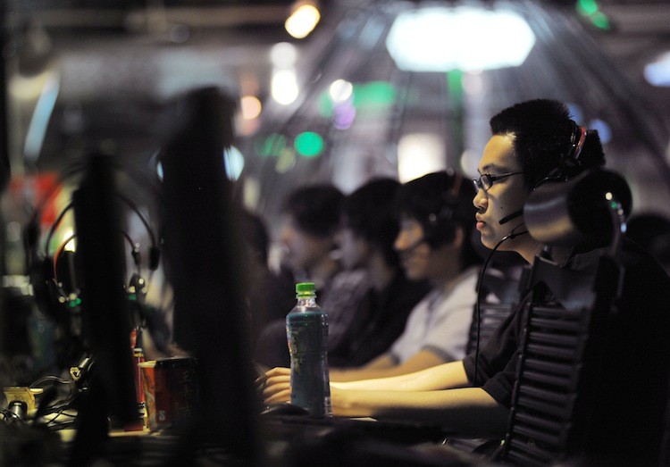 People at an internet cafe in Beijing, China in May 2011. China now has 485 million citizens capable of accessing the Web, more then any other country. (Gou Yige/Getty Images)