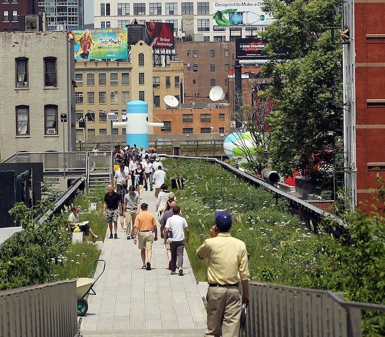 People walk through the second section of the High Line Park on Manhattan west side. (Spencer Platt/Getty Images)