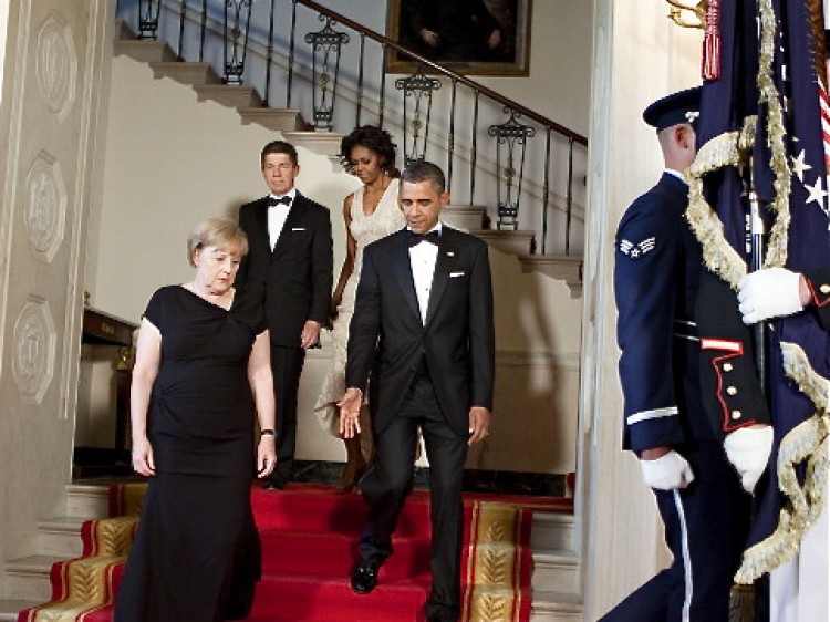 U.S. President Barack Obama (C) and Angela Merkel (L), chancellor of Germany, are followed by First Lady Michelle Obama and Joachim Sauer, Merkel's husband, as they arrive for a portrait at the White House on June 7,  in Washington, DC.  (Joshua Roberts/Getty Images)