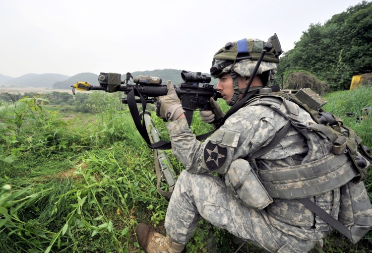 A US soldier takes a position during a joint military drill between South Korea and the US in Paju near the inter-Korean border on June 8, 2011. (Jung Yeon-Je/AFP/Getty Images)