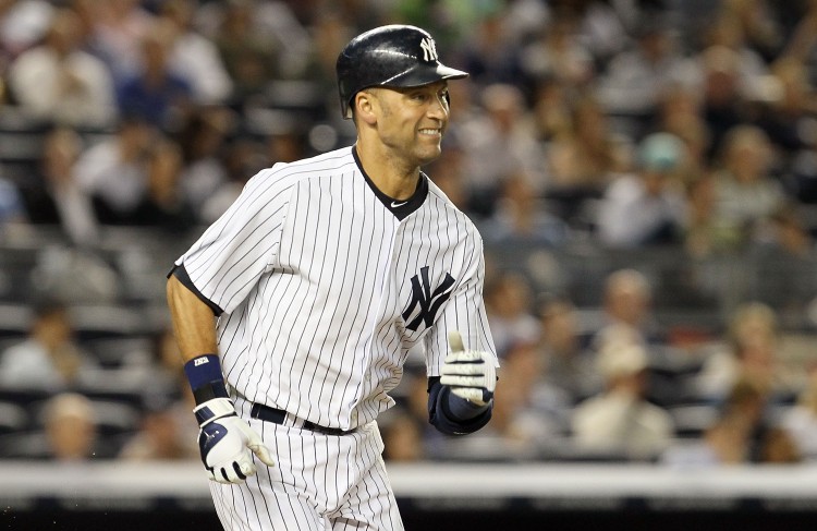 Derek Jeter #2 of the New York Yankees grimaces as he flies out in the fifth inning against the Cleveland Indians on June 13, 2011 at Yankee Stadium in the Bronx borough of New York City. (Jim McIsaac/Getty Images)