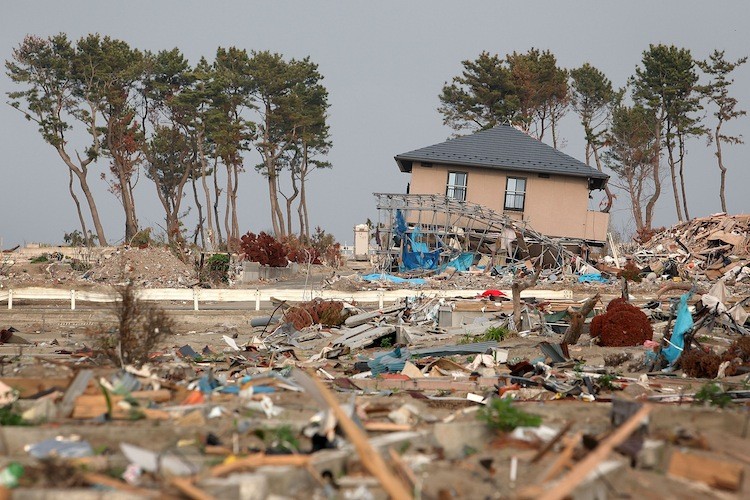 Debris is scattered, after the magnitude 9.0 earthquake and subsequent tsunami on June 13, in Sendai, Miyagi, Japan. Areas in a close vicinity to the Fukushima nuclear power plant will likely remain off limits for several decades. (Kiyoshi Ota/Getty Images)