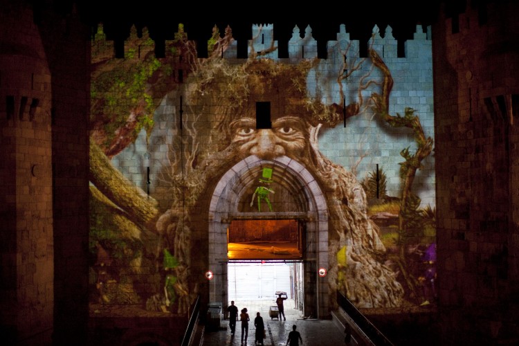 People walk throw the Damascus gate during the Jerusalem Festival of Lights on June 15, 2011 at Jerusalem's Old City, Israel. (Uriel Sinai/Getty Images)