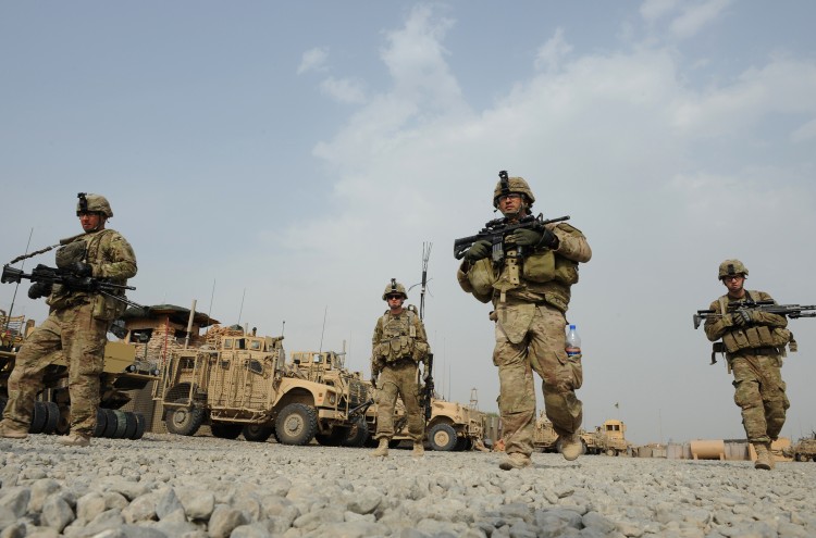 US soldiers from Viper Company (Bravo) 1-26 Infantry head for a foot patrol at Combat Outpost (COP) Sabari in Khost province, east of Afghanistan on June 26, 2011. (Ted Alijibe/AFP/Getty Images)