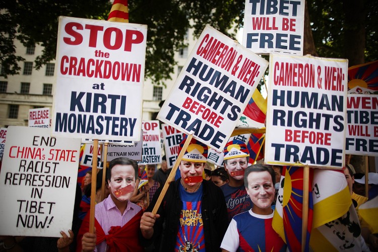 Human rights protesters demonstrate against the visit of Chinese Premier Wen Jiabao on June 27th, 2011, in London (Peter Macdiarmid/Getty Images)