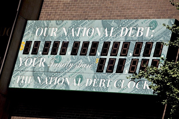 The U.S. National Debt Clock billboard is displayed on a building on Sixth Ave. in midtown Manhattan on July 11, 2011 in the New York City. (Ramin Talaie/Getty Images)