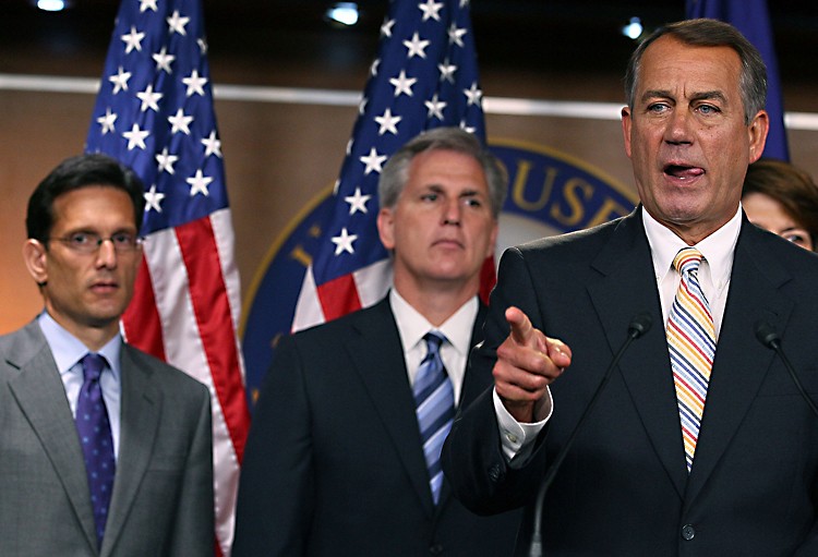 WASHINGTON, DC - JULY 19: House Speaker John Boehner (R-OH) (R) speaks during a news conference at the U.S. Capitol, on July 19, 2011 in Washington, DC. House Republicans introduced a plan to raise the debt ceiling $2.4 trillion, but only after significant spending cuts. (Mark Wilson/Getty Images)