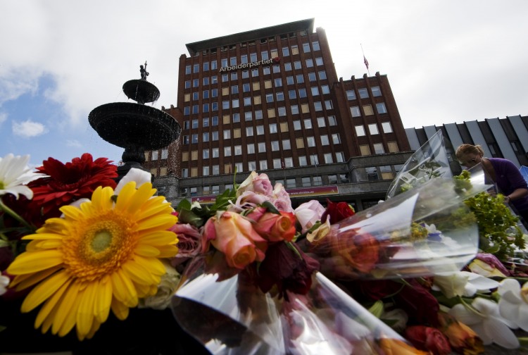 Flowers are placed in front of the damaged Labour Party's headquarters from the July 22 bomb attack in Oslo on July 27, 2011. (Johnathan Nackstrand/AFP/Getty Images)