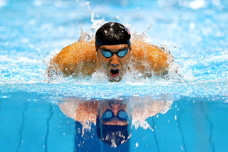 Michael Phelps of the United States competes in the Final of the Men's 400m Individual Medley on Day One of the London 2012 Olympic Games. (Al Bello/Getty Images)
