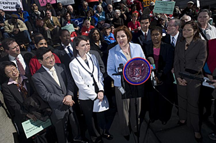 SAVING SENIOR CENTERS: City Council Speaker Christine Quinn speaks on City Hall steps before fellow council members, seniors, and advocates.W (illiam Alatriste)