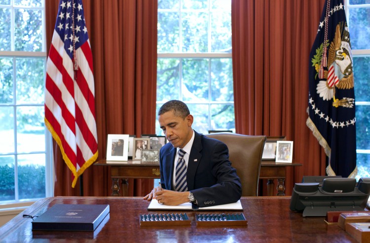 DONE: In this handout provided by the White House, U.S. President Barack Obama signs the Budget Control Act of 2011 in the Oval Office August 2 in Washington, D.C.  (Pete Souza/The White House via Getty Images)