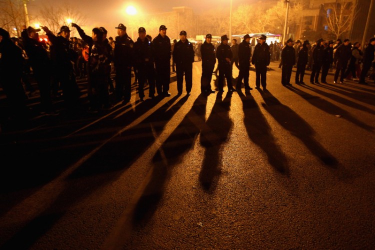 Chinese police blockade a road, Feb. 17, 2011.