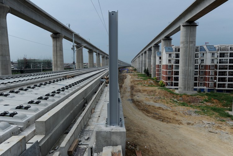 China has suspended all new railway construction projects, as controversy swirls over the nation's high-speed network nearly three weeks after a fatal crash sparked safety concerns.  (STR/AFP/Getty Images)