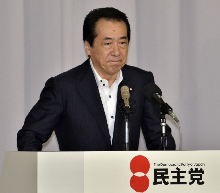 Japan's Prime Minister Naoto Kan announces his resignation as president of the Democratic Party of Japan (DPJ), effectively ending his tenure as Japanese leader, in Tokyo, on Aug. 26.  (Yoshikazu Tsuno/AFP/Getty Images)