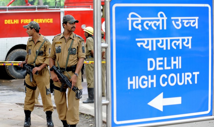 Indian police commandos stand guard in front of Delhi High Court in New Delhi on September 8, 2011.  (Raveendran/AFP/Getty Images)