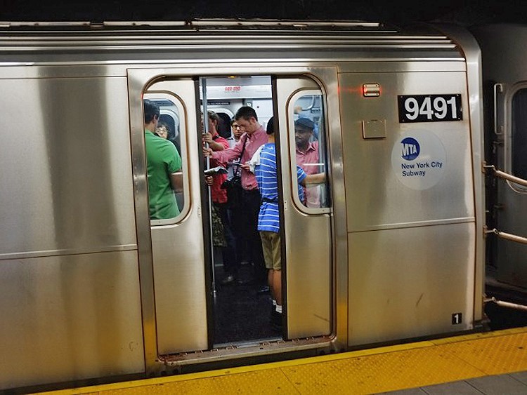 People ride the New York City subway into Manhattan during the morning commute on September 9, 2011 in New York City. (Spencer Platt/Getty Images)