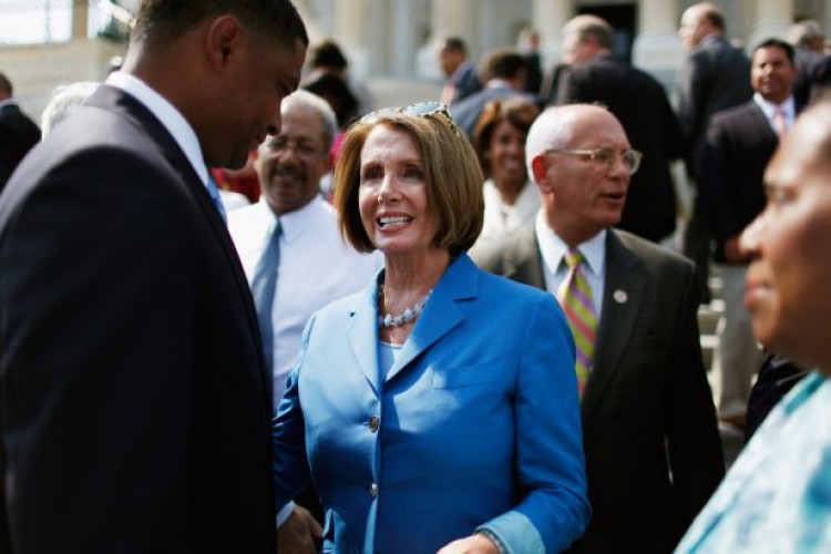 House Minority Leader Nancy Pelosi (D-Calif.) (C) talks with U.S. Rep. Cedric Richmond (D-La.) on the steps of the Capitol on Sept. 14. (Chip Somodevilla/Getty Images)