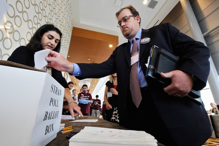 Dan Sharp votes during the straw poll at the California Republican Party Convention on September 17, in Los Angeles, California. State governments across the country have enacted an array of new laws making voting and registering to vote more difficult than it has been in decades.  (Kevork Djansezian/Getty Images)