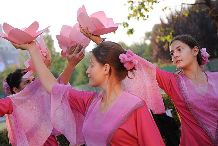 Falun Gong members from various countries perform a dance during a demonstration and peaceful protest in downtown Bucharest, on September 24, 2011. A group of Romanians and foreigners marched to the Chinese Embassy aiming to draw the public's attention to the crimes of the Chinese communist regime against Falun Gong members during over 12 years of persecution. (Daniel Mihailescu/AFP/Getty Images)