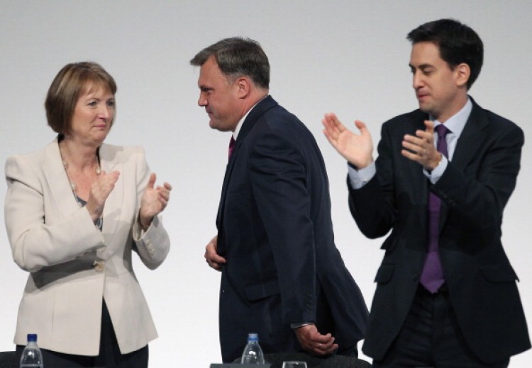 Labour's Shadow Chancellor Ed Balls receives applause from deputy party leader Harriet Harman (L) and leader Ed Miliband after addressing the Labour party conference at the Echo Arena on September 26, 2011 in Liverpool, England.  During his keynote speech to delegates, Shadow chancellor Ed Balls announced a five point plan to boost jobs and economy.  (Jeff J Mitchell/Getty )