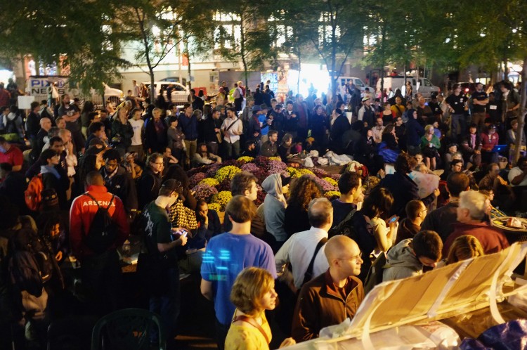 Wall Street protesters participate in a meeting at Zuccotti Park where hundreds of activists are living on Oct. 11 in New York City. (Spencer Platt/Getty Images)