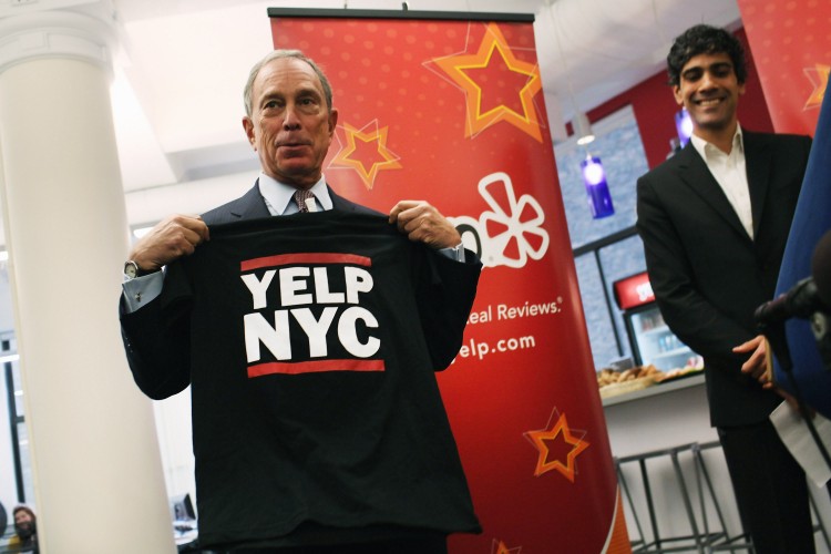 Mayor Michael Bloomberg poses for photos at the opening ceremony of Yelp's East Coast headquarters on Oct. 27. (Spencer Platt/Getty Images)