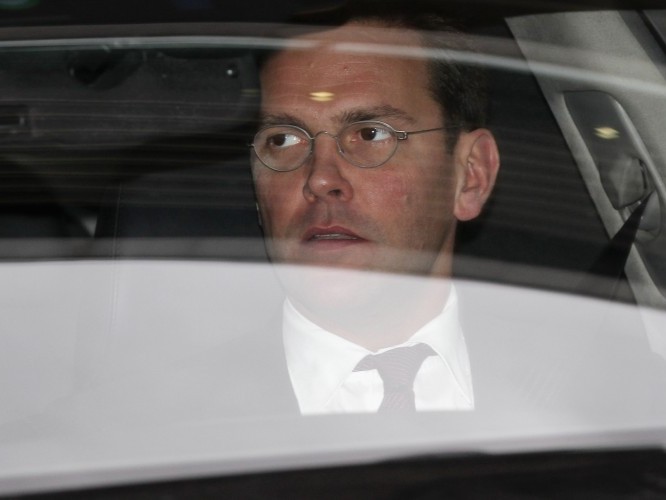 James Murdoch leaves the annual general meeting of BSkyB 
