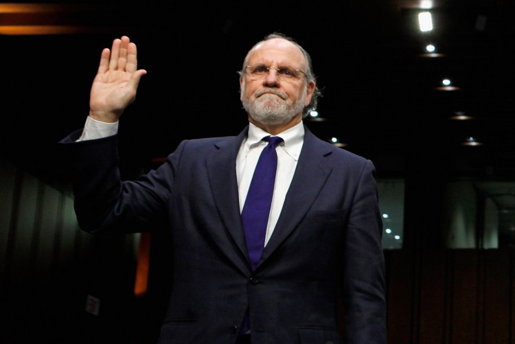 Former MF Global CEO Jon S. Corzine is being sworn in to testify at a congressional hearing on Dec. 13, 2011, regarding his firm's demise.  (Chip Somodevilla/Getty Images) 