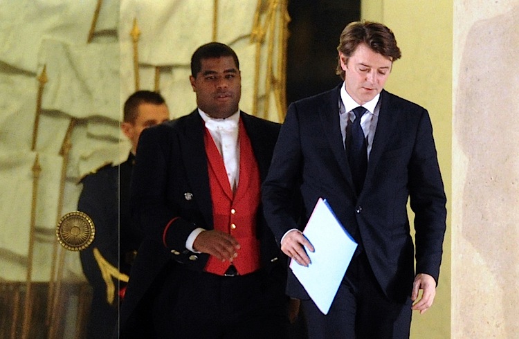 French Economy Minister François Baroin (R) leaves the Elysée Palace