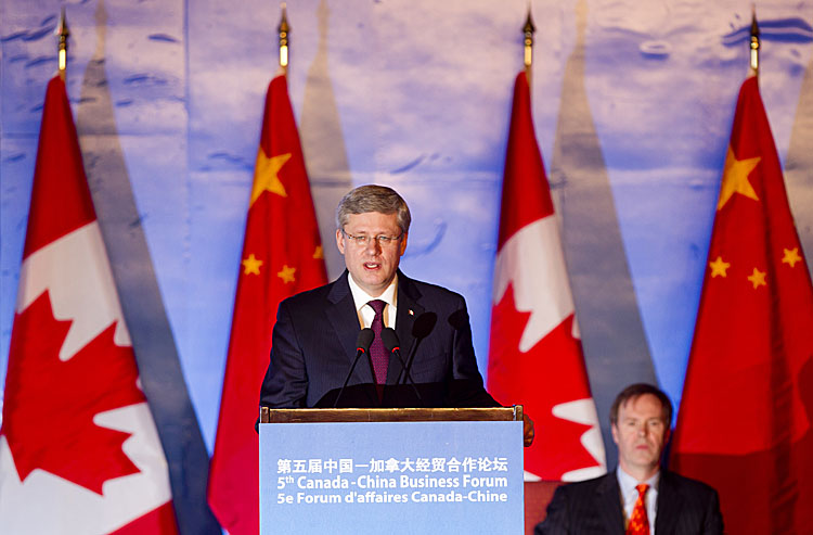 Canadian Prime Minister Stephen Harper delivers a speech