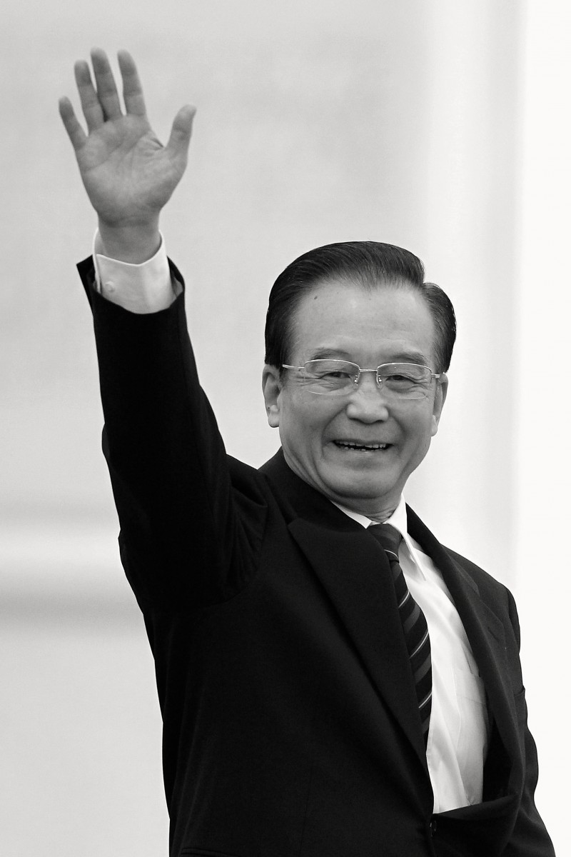 remier Wen Jiabao waves after finishing a March 14 news conference in Beijing. Lintao Zhang/Getty Images 