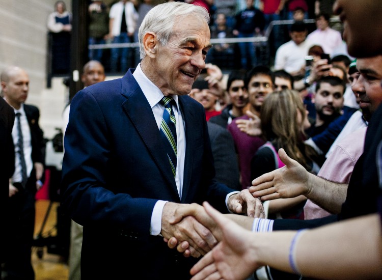 Republican Presidential hopeful Rep. Ron Paul (R-Texas) greets supporters during a town hall meeting at the University of Maryland on March 28 in College Park, Md. Paul has said he will continue his campaign as Republican presidential nominee, the last remaining rival to Romney, despite failing to win any states so far. (T.J. Kirkpatrick/Getty Images) 
