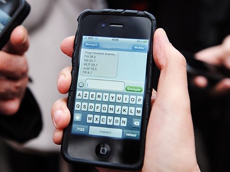 People receive sms on their mobile phone
