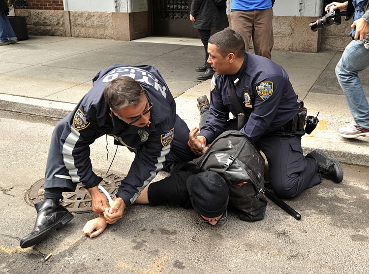 New York Police Department officers arrest an Occupy Wall Street protester