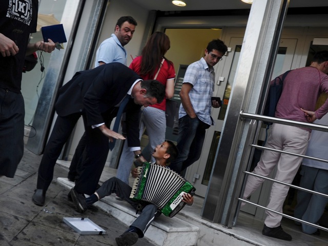 People line up outside a Greek bank