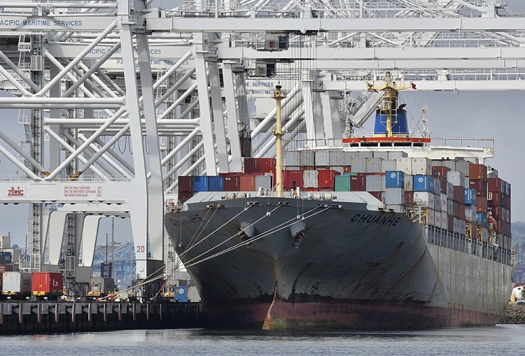 A cargo ship stands on Long Beach harbour, California