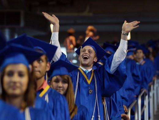 Yoel Lapsher and other graduates arrive for the graduation ceremony