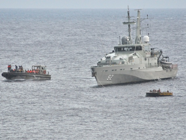 A Royal Australian Navy Ship takes part in a rescue effort