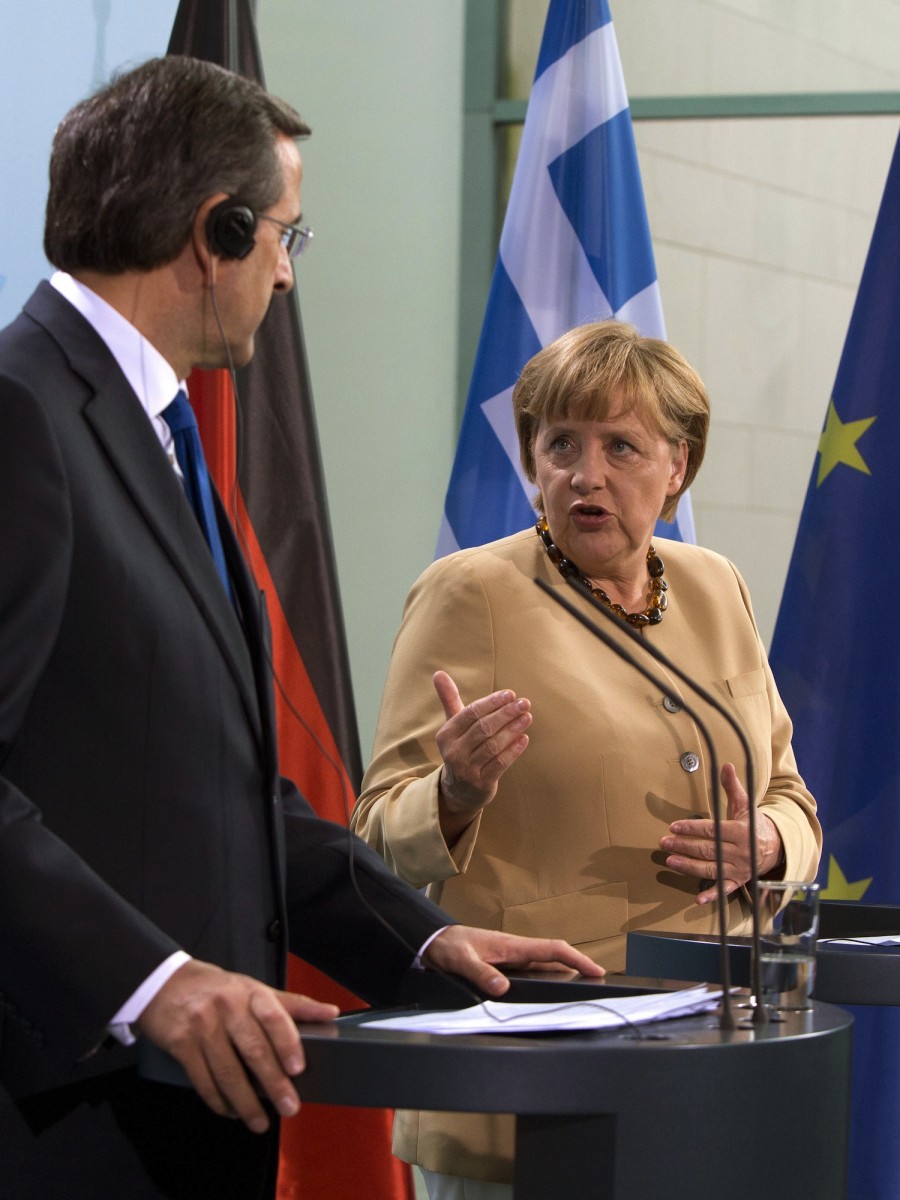 German Chancellor Angela Merkel (R) and Greek Prime Minister Antonis Samaras give a press conference on Aug. 24 at the Chancellery in Berlin.  Pete Gannon/AFP/Getty Images 
