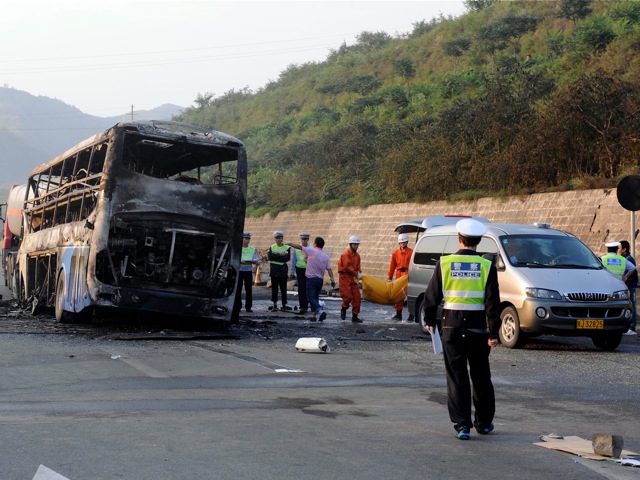 a burnt out double-decker sleeper bus