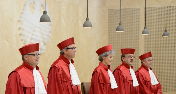 The judges of Germany's Constitutional Court arrive to give their verdict on Germany's ratification of the European Stability Mechanism (ESM) on Sept. 12, in Karlsruhe, Germany. The court ruled that the measure does not run contrary to Germany's Constitution and added regulatory requirements to this decision. (Matthias Hangst/Getty Images) 