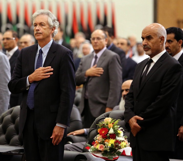 U.S. Deputy Secretary of State for Middle East Affairs William J. Burns (L) and Mohamed Yusuf Al Magariaf, president of Libya's ruling General National Congress (R), attend a ceremony to honour late U.S. ambassador J. Christopher Stevens, on Sept. 20, 2012, in Tripoli. (Mahmud Turkia/AFP/GettyImages) 